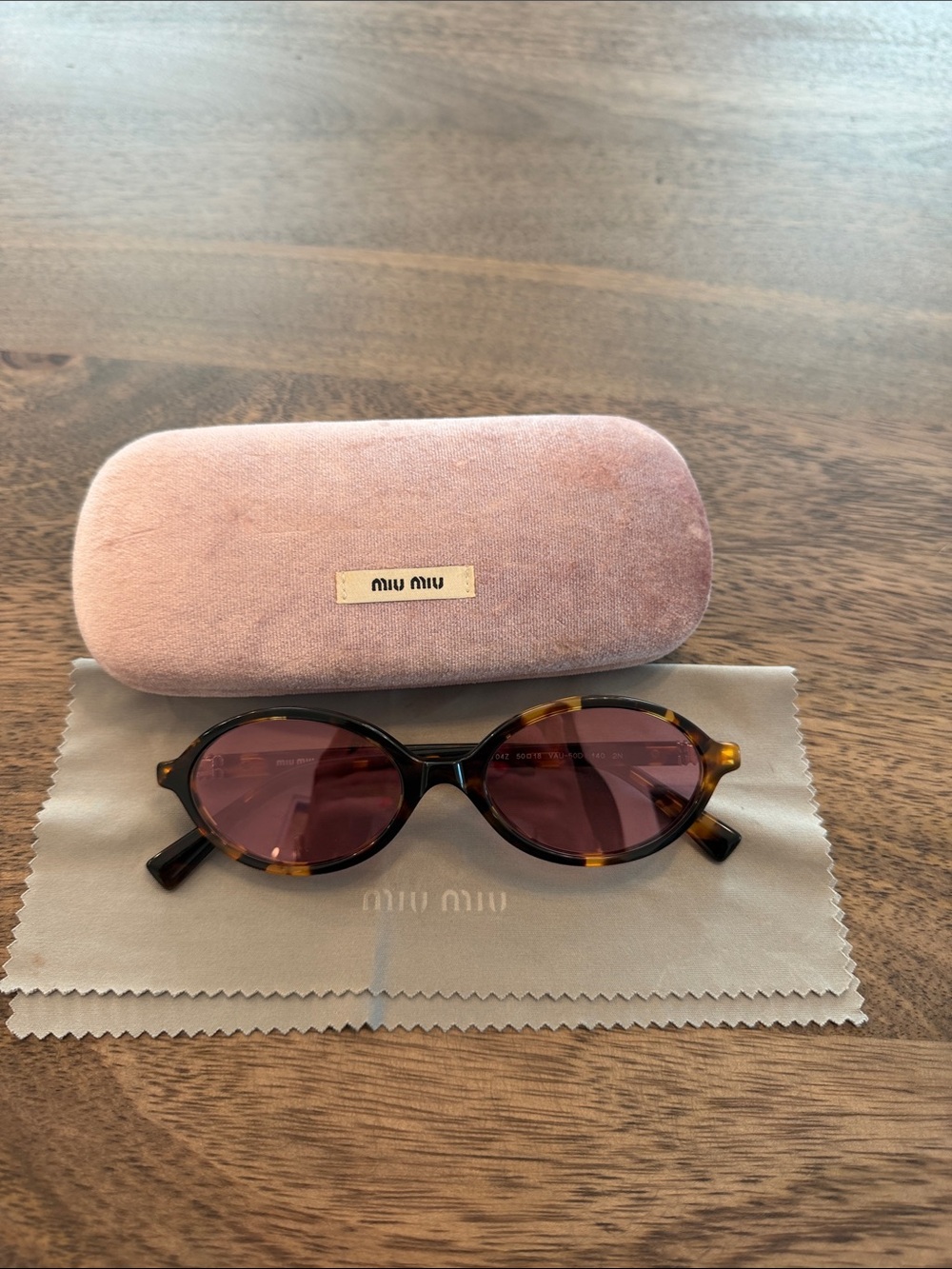 Miu Miu Tortoiseshell Frame Sunglasses with Rose Lenses